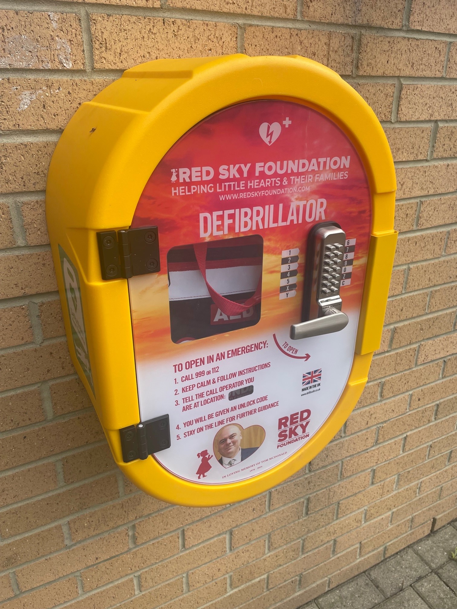 Defibrillator Installed at B&B Attachments in Memory of Tom McDonald